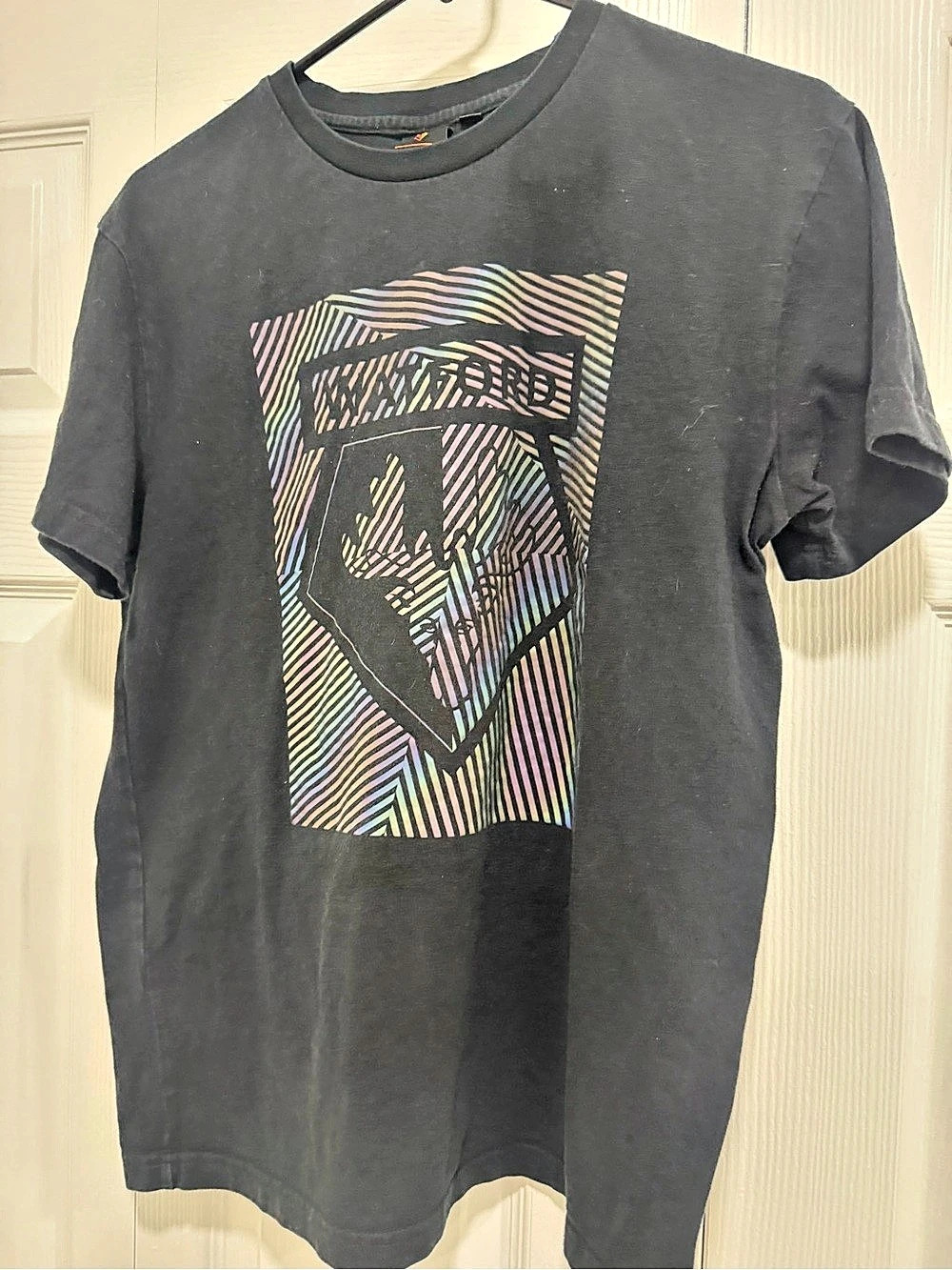The Official Merchandise Graphic Short Sleeve Tee in Black Size Medium